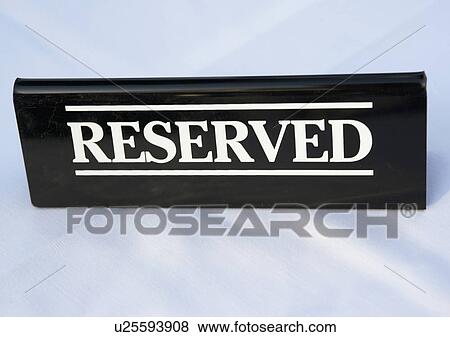 Close up of Reserved sign View Large Photo Image Stock Photo - Close up of Reserved sign. Fotosearch