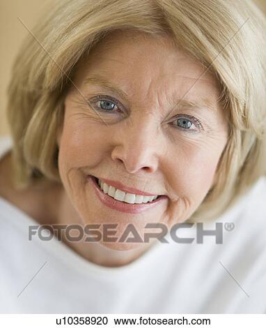 Stock Image - Close up of senior woman smiling. Fotosearch