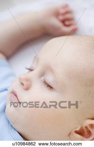 Close up of sleeping baby View Large Photo Image Stock Image - Close up of sleeping baby. Fotosearch
