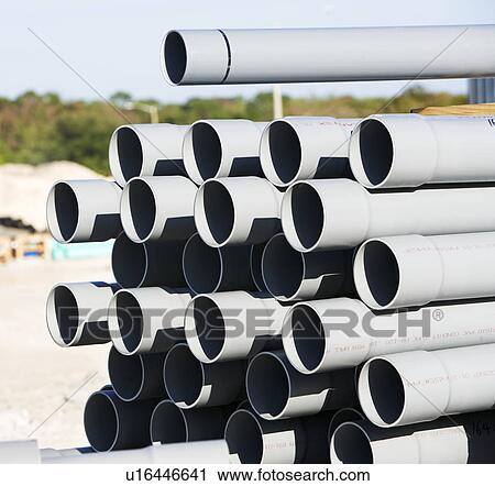 Stock Image - Close up of stack of pipes. Fotosearch