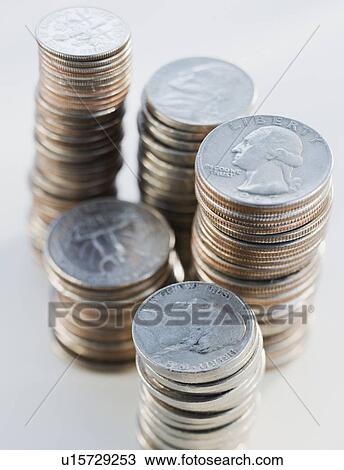 Stock Image - Close up of stacks of coins. Fotosearch