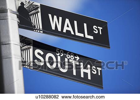 Stock Image - Close up of street signs in the Financial District, New York City. Fotosearch