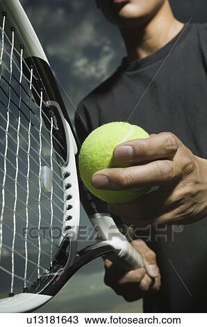 Stock Image - Close up of tennis player. Fotosearch