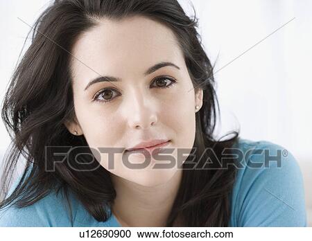 Stock Image - Close up of woman smiling. Fotosearch