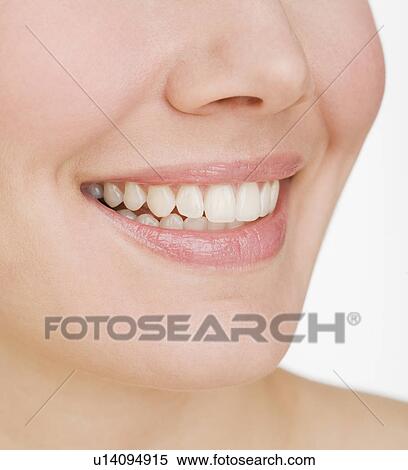 Close up of woman smiling View Large Photo Image Stock Photography - Close up of woman smiling. Fotosearch
