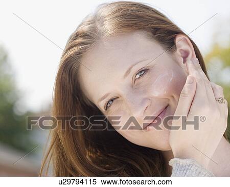 Stock Photography - Close up of woman smiling. Fotosearch