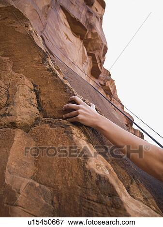 Close up of woman’s arm rock climbing View Large Photo Image Stock Photo - Close up of woman’s arm rock climbing. Fotosearch