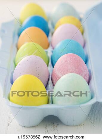 Stock Image - Closeup of colored Easter eggs. Fotosearch