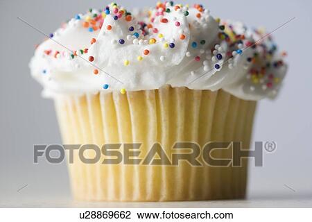 Closeup of cupcake with sprinkles View Large Photo Image Stock Image - Closeup of cupcake with sprinkles. Fotosearch