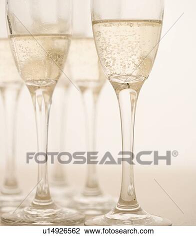 Closeup of glasses of champagne View Large Photo Image Stock Image - Closeup of glasses of champagne. Fotosearch