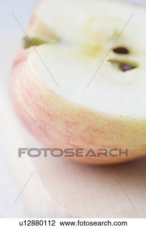 Closeup of halved apple View Large Photo Image Stock Image - Closeup of halved apple. Fotosearch