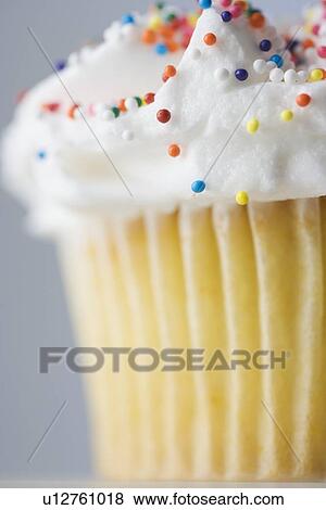 Closeup of side of cupcake View Large Photo Image Stock Photo - Closeup of side of cupcake. Fotosearch