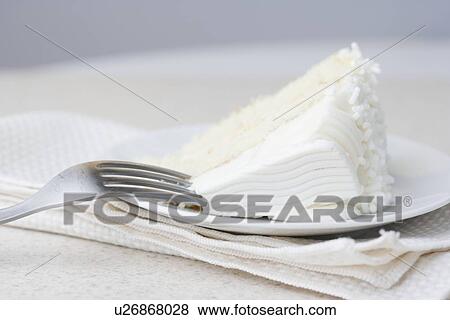 Closeup of slice of white cake View Large Photo Image Stock Photo - Closeup of slice of white cake. Fotosearch