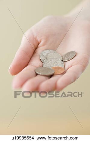Coins in woman’s hand View Large Photo Image Picture - Coins in woman’s hand. Fotosearch