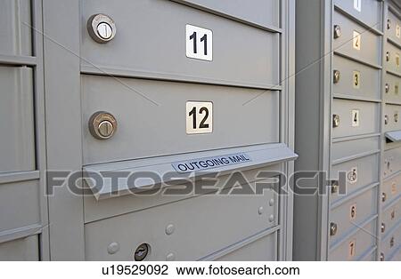 Columns of locked mailboxes View Large Photo Image Stock Image - Columns of locked mailboxes. Fotosearch