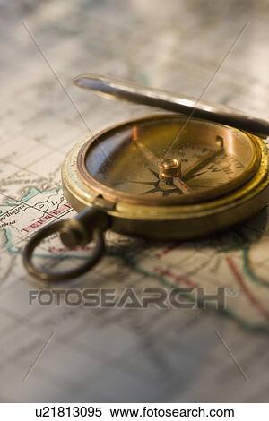 Compass on antique map View Large Photo Image Stock Photography - Compass on antique map. Fotosearch