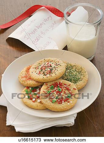 Stock Image - Cookies and milk for Santa Claus. Fotosearch