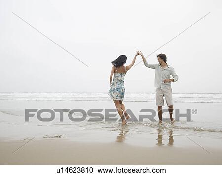 Couple dancing at beach View Large Photo Image Stock Image - Couple dancing at beach. Fotosearch