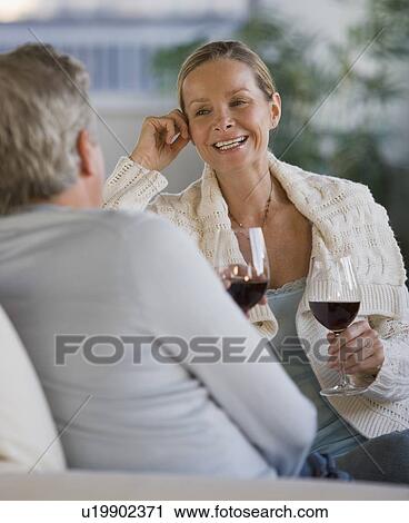 Couple drinking wine View Large Photo Image Stock Image - Couple drinking wine. Fotosearch