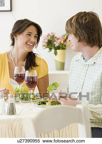 Couple eating at restaurant View Large Photo Image Stock Photography - Couple eating at restaurant. Fotosearch