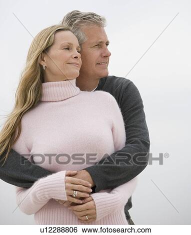 Couple hugging View Large Photo Image Stock Photograph - Couple hugging. Fotosearch