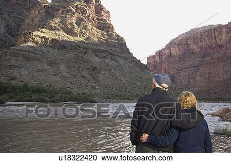 Couple looking at river, Colorado River, Moab, Utah, United States View Large Photo Image Stock Image - Couple looking at river, Colorado River, Moab, Utah, United States. Fotosearch
