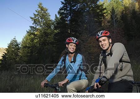 Couple on mountain bikes, Utah, United States View Large Photo Image Stock Photography - Couple on mountain bikes, Utah, United States. Fotosearch