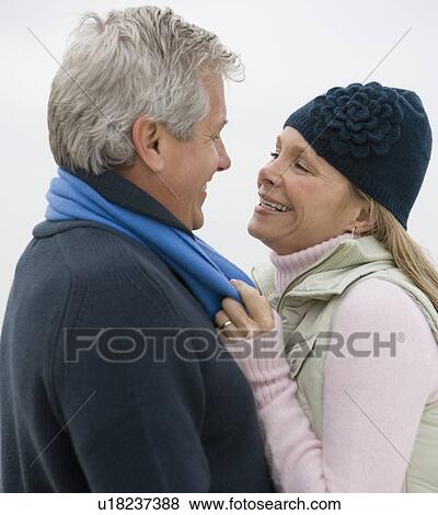 Couple smiling at each other View Large Photo Image Stock Photo - Couple smiling at each other. Fotosearch