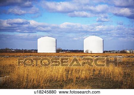 Cylindrical containers in rural area View Large Photo Image Stock Image - Cylindrical containers in rural area. Fotosearch