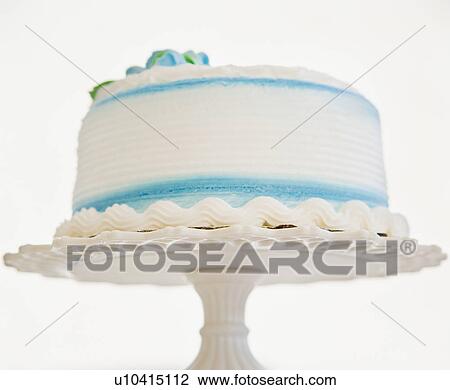 Stock Image - Decorated cake on pedestal. Fotosearch