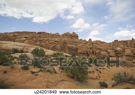Stock Photo - Desert landscape under blue sky. Fotosearch