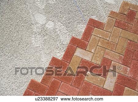 Stock Photo - Edge of new brick patio. Fotosearch