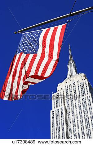 Empire State Building and American Flag, New York City View Large Photo Image Stock Photo - Empire State Building and American Flag, New York City. Fotosearch