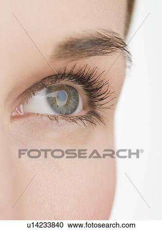 Stock Image - Extreme close up of woman’s eye. Fotosearch