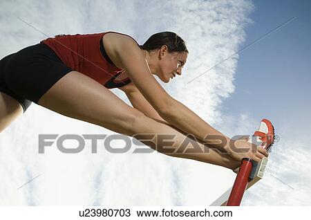 Female athlete stretching, Utah, United States View Large Photo Image Stock Image - Female athlete stretching, Utah, United States. Fotosearch