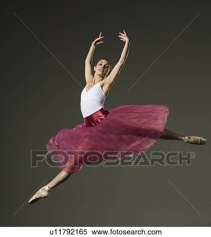 Female ballet dancer jumping View Large Photo Image Stock Photography - Female ballet dancer jumping. Fotosearch
