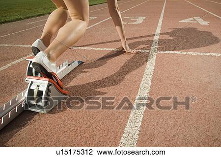 Female runner at starting block, Utah, United States View Large Photo Image Stock Image - Female runner at starting block, Utah, United States. Fotosearch