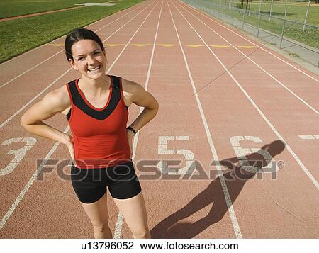 Female runner with hands on hips, Utah, United States View Large Photo Image Stock Image - Female runner with hands on hips, Utah, United States. Fotosearch