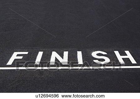 Finish line painted on asphalt View Large Photo Image Stock Photograph - Finish line painted on asphalt. Fotosearch