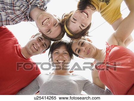 Friends in huddle View Large Photo Image Stock Photography - Friends in huddle. Fotosearch
