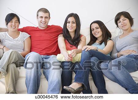 Friends on sofa View Large Photo Image Stock Photograph - Friends on sofa. Fotosearch