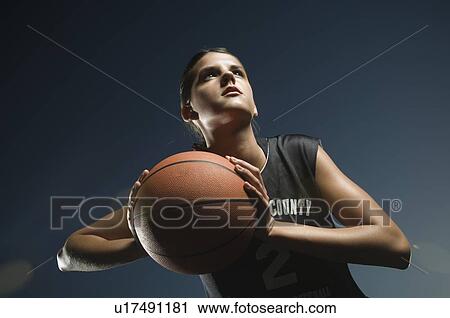 Girl holding basketball View Large Photo Image Stock Image - Girl holding basketball. Fotosearch