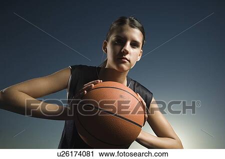 Girl holding basketball View Large Photo Image Stock Image - Girl holding basketball. Fotosearch