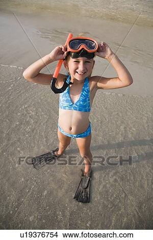 Girl wearing snorkeling gear, Florida, United States View Large Photo Image Picture - Girl wearing snorkeling gear, Florida, United States. Fotosearch