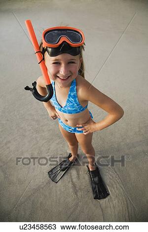 Stock Image - Girl wearing snorkeling gear, Florida, United States. Fotosearch