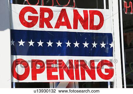 Grand Opening sign in store window View Large Photo Image Stock Image - Grand Opening sign in store window. Fotosearch