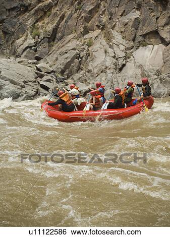 Group of people river rafting View Large Photo Image Stock Photograph - Group of people river rafting. Fotosearch