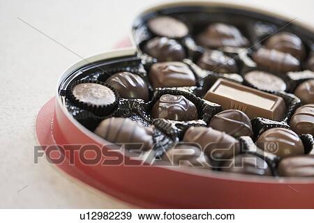 Heart shaped box of chocolates View Large Photo Image Stock Photo - Heart shaped box of chocolates. Fotosearch