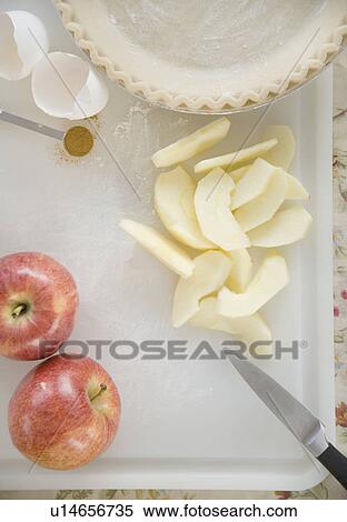High angle view of slice apples and pie crust View Large Photo Image Stock Photography - High angle view of slice apples and pie crust. Fotosearch