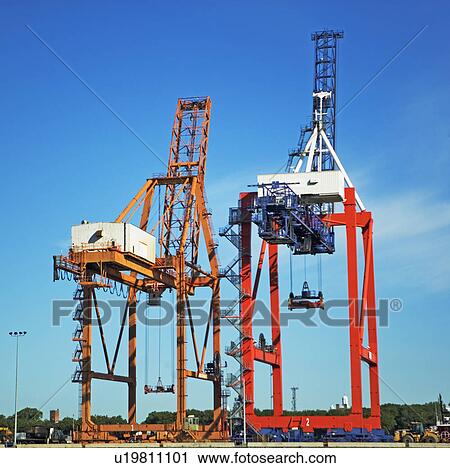 Industrial dock equipment and cranes View Large Photo Image Stock Image - Industrial dock equipment and cranes. Fotosearch